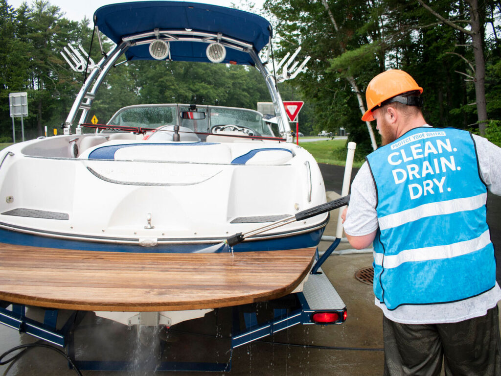 Volunteer cleaning with hot water